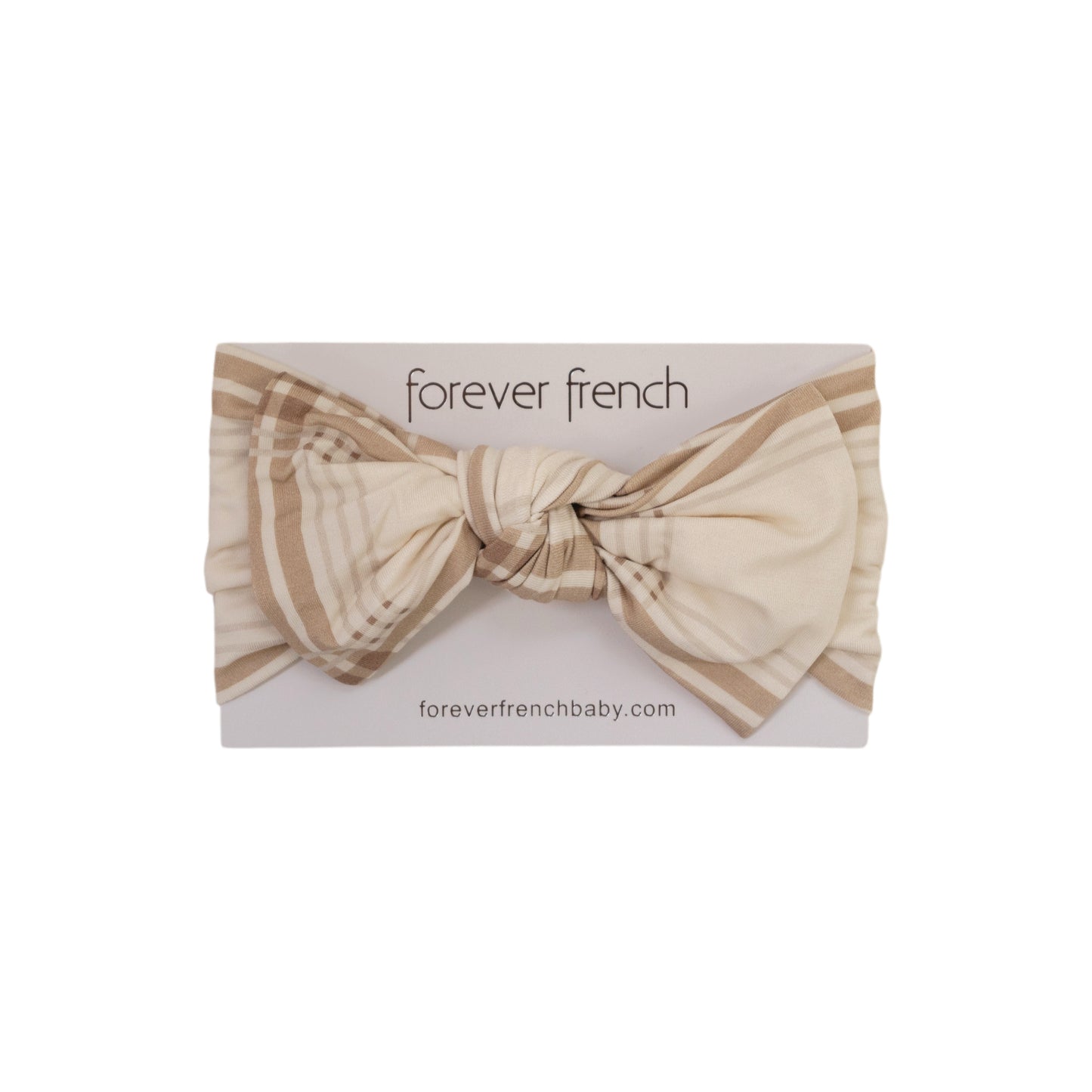 The Bamboo Head Wrap | Ellis Plaid by forever french baby features a cream and light brown plaid pattern with a large bow, displayed on branded packaging from forever french baby.