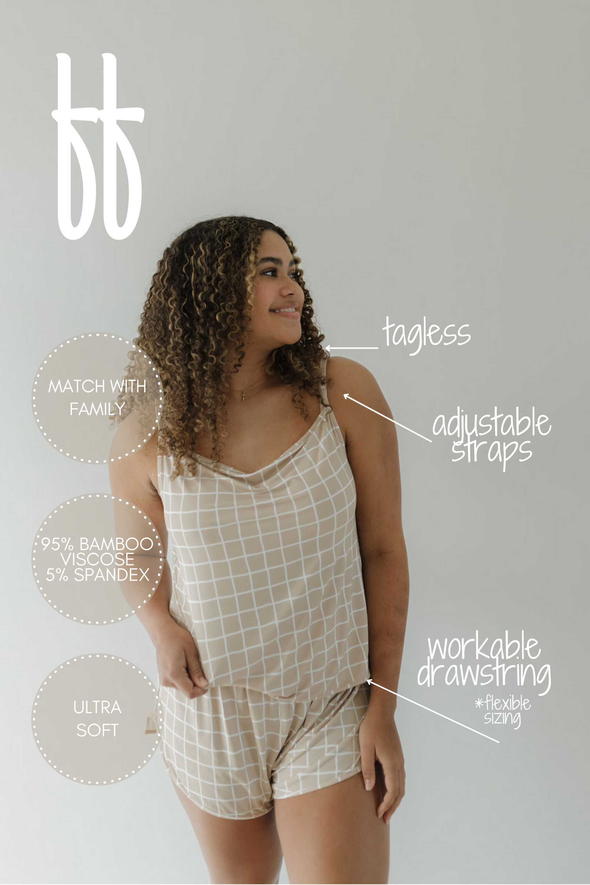 A person with curly hair models the Cami Women's Bamboo Set | Grid by forever french baby, wearing matching beige plaid pajamas against a light background. The bamboo fabric is praised for its breathability, adjustable straps, workable drawstring, tagless comfort, soft texture, and hypo-allergenic properties.