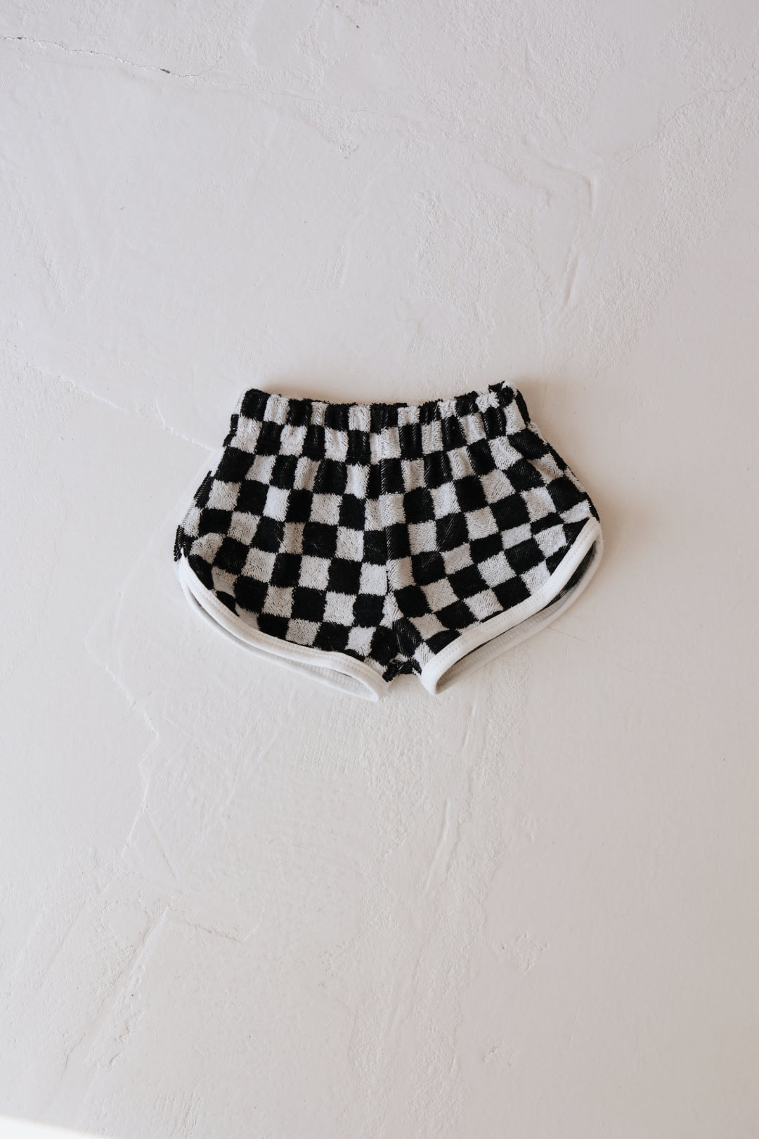 Children s Terry Cloth Shorts Black White Checkerboard forever french baby