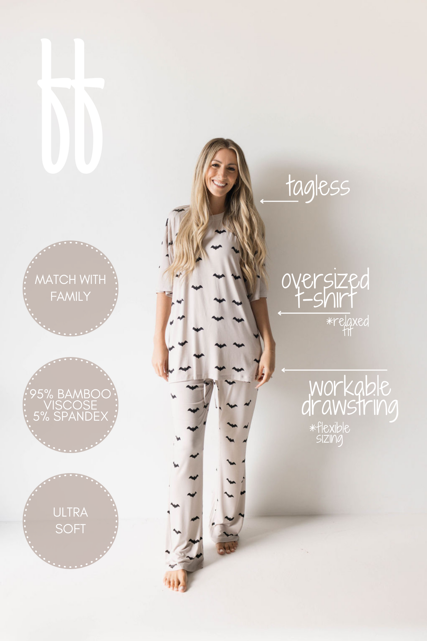 A woman stands smiling against a plain white background, wearing an oversized pajama set from forever french baby's Short Sleeve Women's Bamboo Pajamas | It's Bats! collection. The text describes these bamboo pajamas as "tagless," featuring an "oversized t-shirt," a "workable drawstring," and made of "95% bamboo viscose, 5% spandex." They are noted for being "ultra soft" and perfect to "match with family.