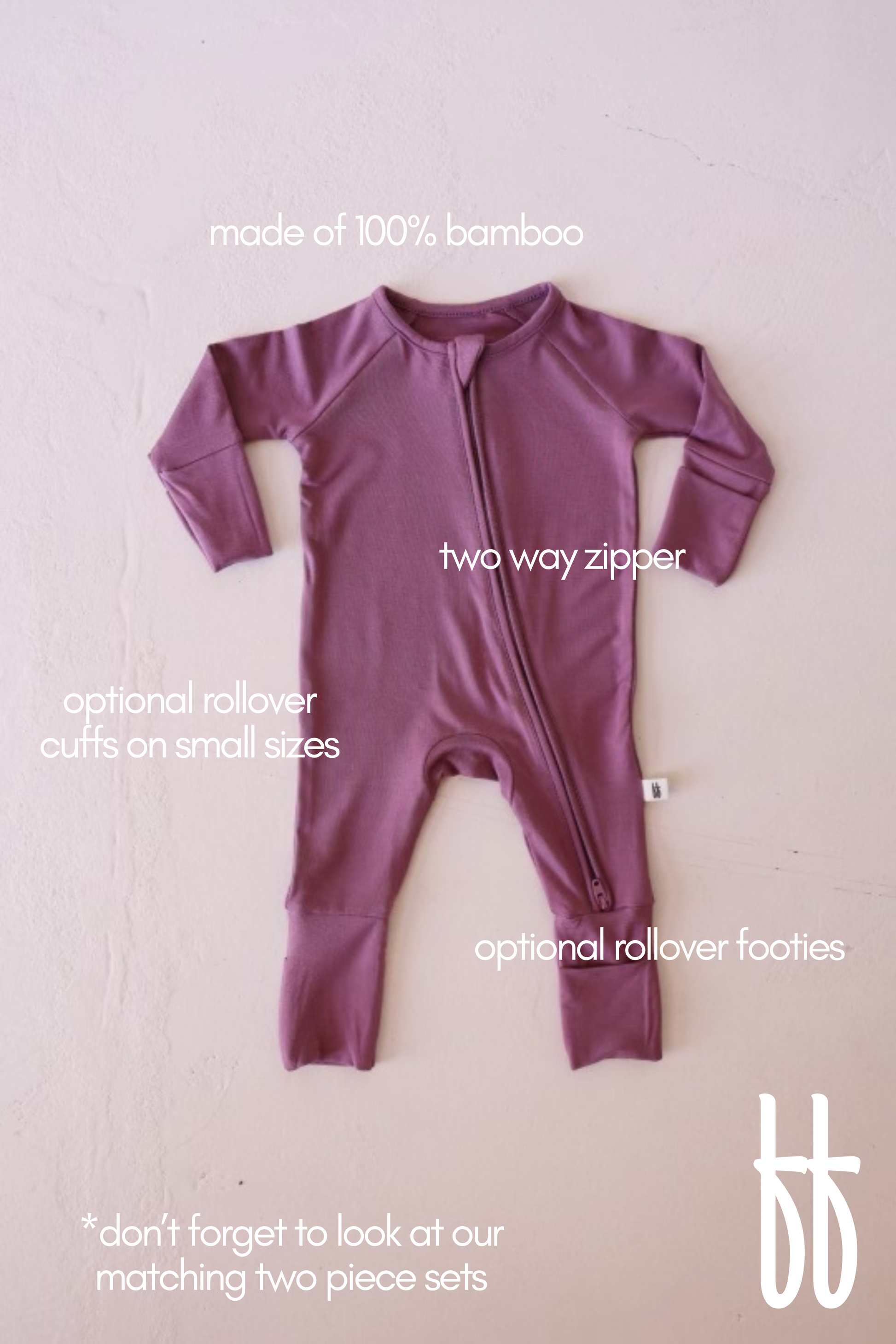 The Bamboo Zip Pajamas in Amethyst by forever french baby is a mauve-colored baby onesie with long sleeves and a two-way zipper, made from 100% bamboo. This hypoallergenic piece features optional rollover cuffs on small sizes and optional rollover footies. Note: Check out matching bamboo pajamas for adorable two-piece sets.