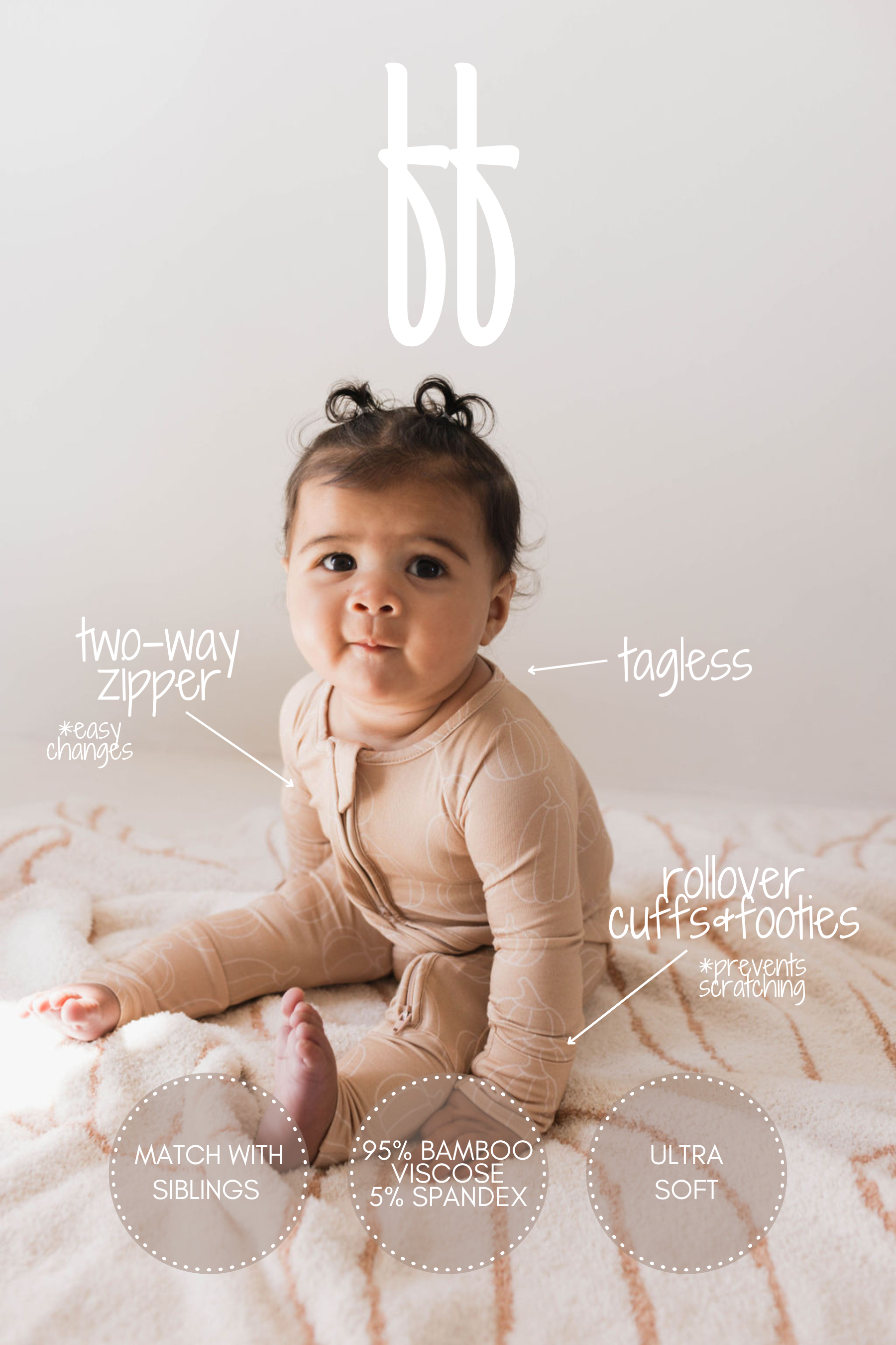 A baby sits on a soft, white and pink blanket, wearing forever french baby's ultra-soft, hypo-allergenic Bamboo Zip Pajamas in the Pumpkin Pie design. This beige onesie features a two-way zipper, rollover cuffs, and footies. Made of 95% bamboo viscose and 5% spandex, it’s breathable clothing that can match with siblings. Text points to these features on the image.