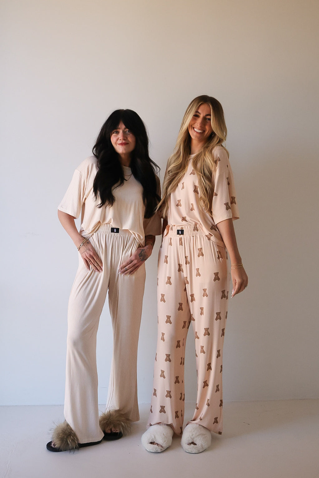 Two women smile side by side in forever french baby Women's Boxy Tee Lounge Set | Sadie Stripe. Hypo-allergenic bamboo fabric and chic design make these lounge sets perfect for cozy relaxation.