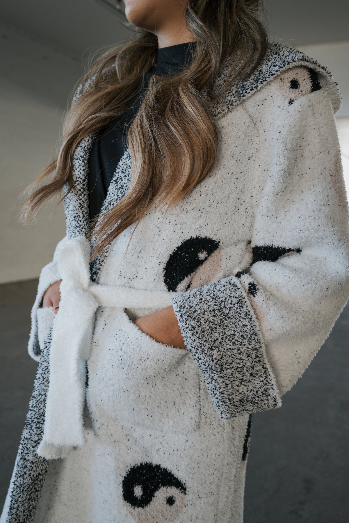 A forever french baby Adult Robe | Yin Yang, a plush white microfiber adult robe featuring a black yin-yang pattern and a tie belt.