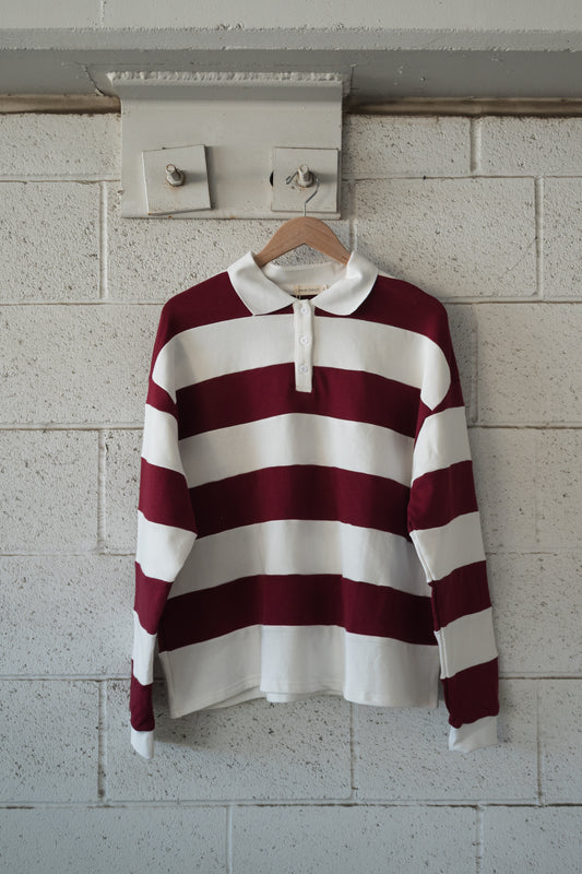 Forever French Baby Adult Rugby Sweatshirt | Deep Cranberry, an oversized style featuring horizontal deep cranberry and white stripes, a white collar, and a three-button placket.