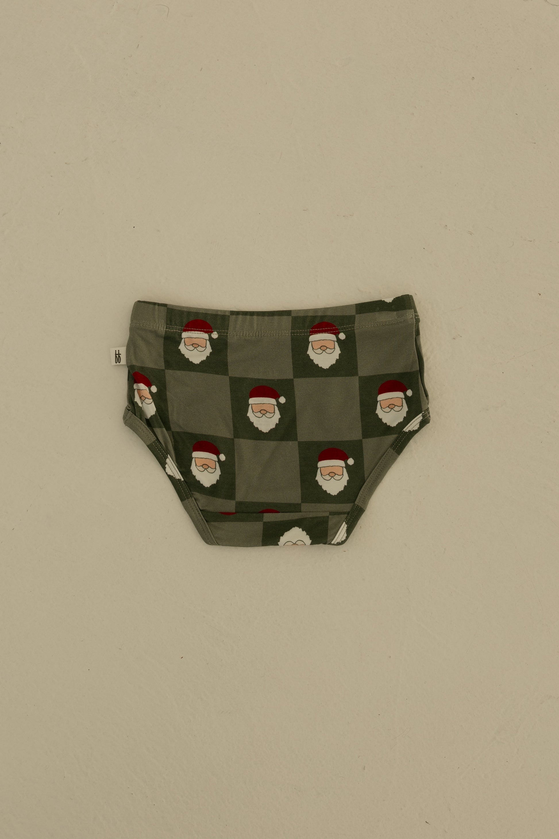 Forever french baby Girl's Bamboo Briefs (3 Pack) in Red Gingham, Candy Cane & Santa Checkerboard prints—shown flat on a light beige background. Made from hypo-allergenic bamboo for comfort and style.