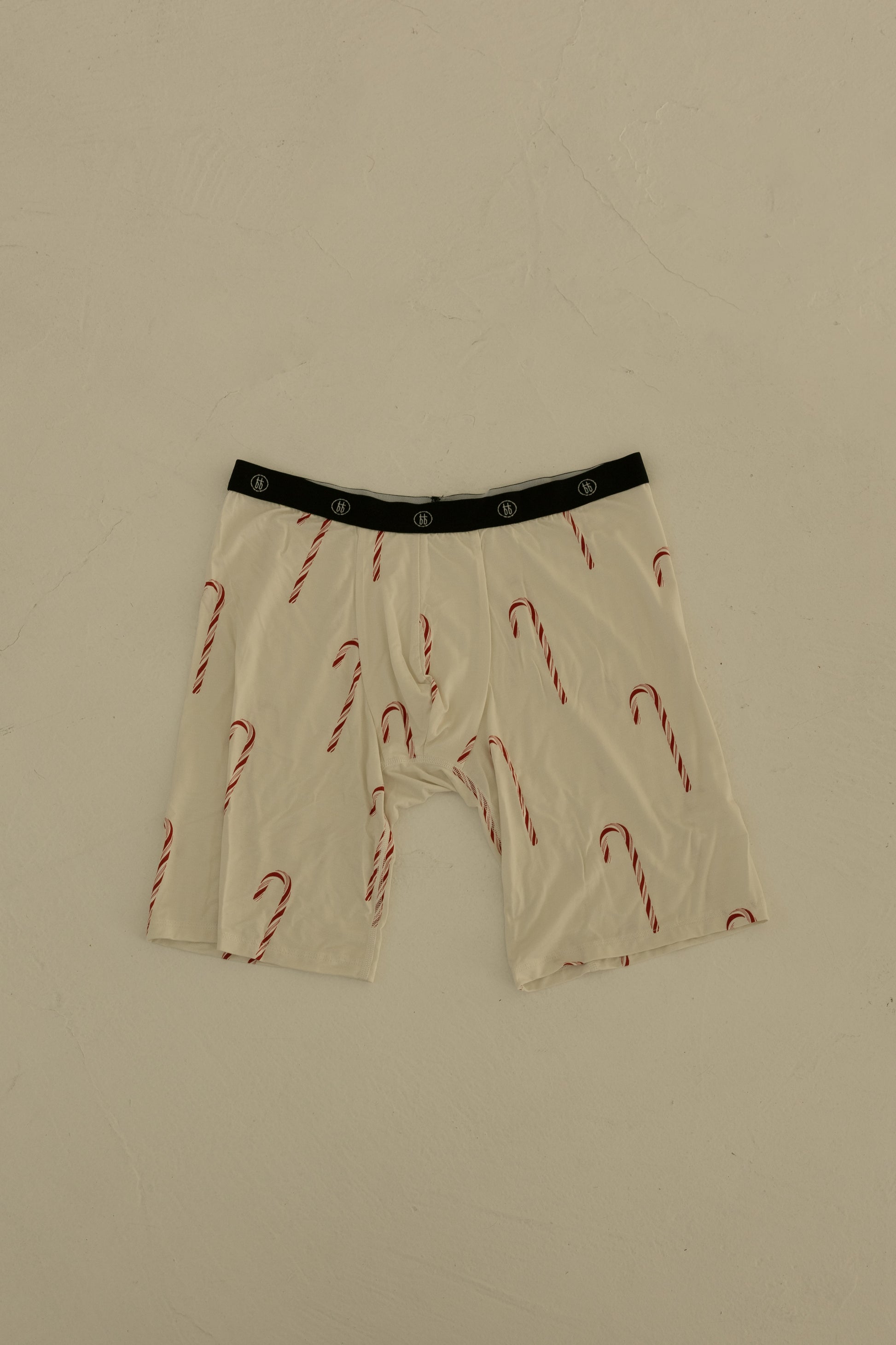 Forever french baby Men's Bamboo Boxers (3 Pack) shown in the Candy Cane design: white, breathable boxers with a black waistband and red and white candy canes, laid flat on a light surface.