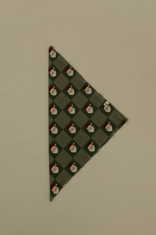 The forever french baby Bamboo Bandana | Santa Checkerboard is a soft, green bamboo viscose bandana with a diamond Santa Claus pattern, shown flat on a neutral background.