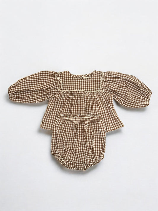 The Bloomer Set | Honey Gingham by forever french baby is a brown and white gingham newborn set with a long puffed sleeve top and matching bloomers, displayed flat on a white background.