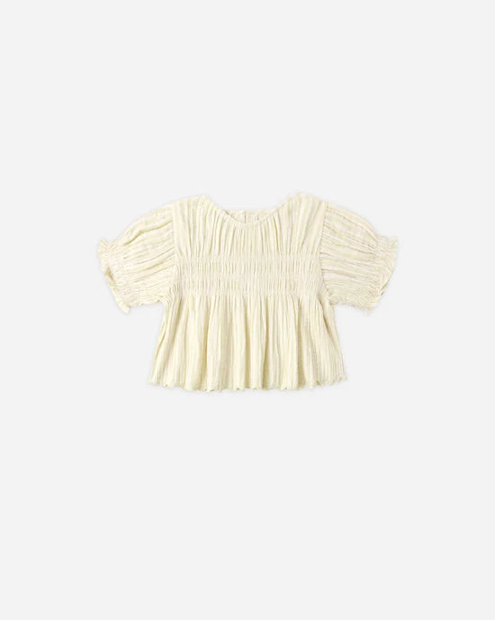 Cream-colored, short-sleeve Colette Top in Citron Stripe by Rylee + Cru, featuring a loose fit with textured, pleated fabric and delicate embroidered scallop edge detailing, displayed on a plain light background.