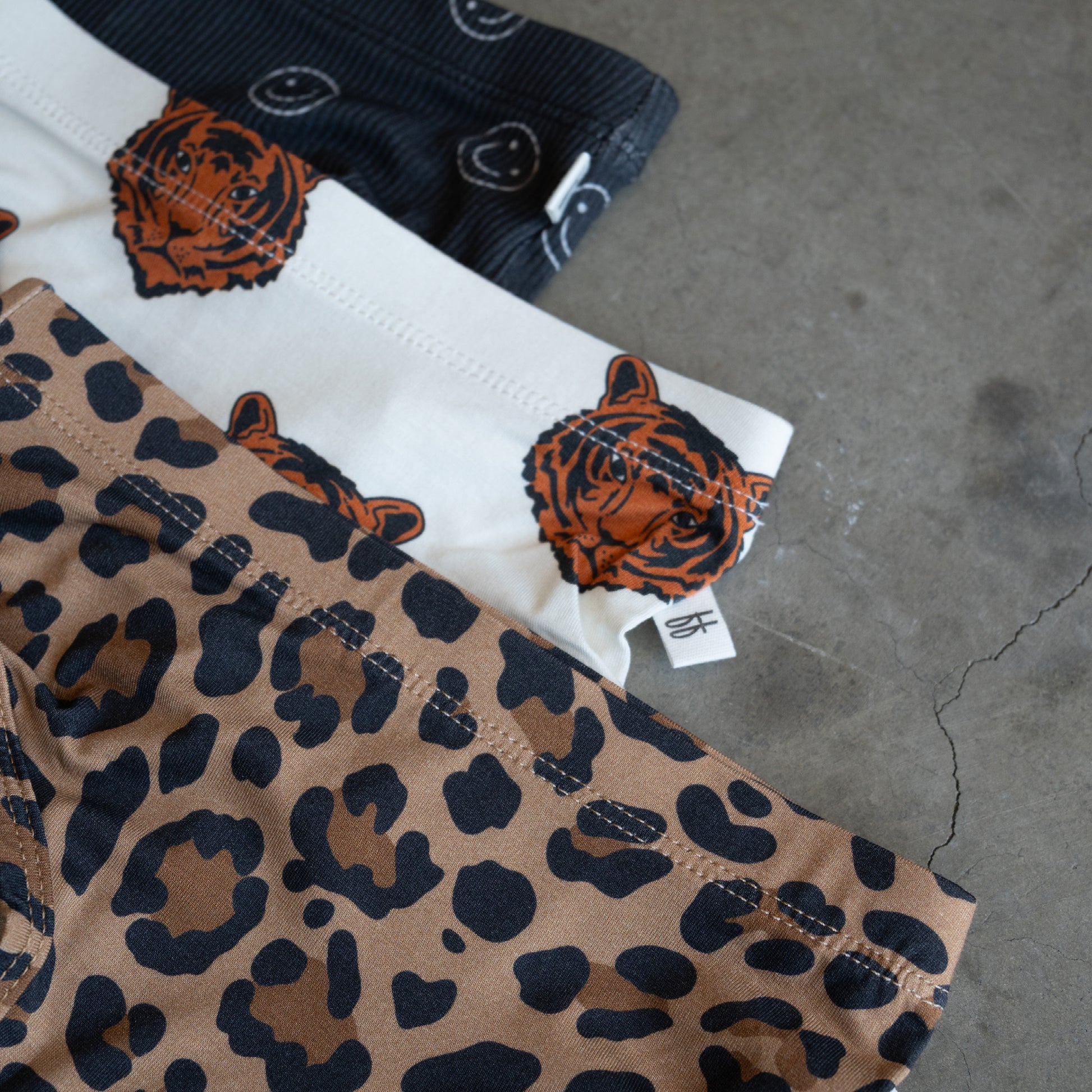 The forever french baby Girl's Bamboo Briefs (3 Pack)—Leopard, Tigers & Smiley Ribbed—are hypo-allergenic, gentle on sensitive skin, and feature playful animal prints for girls.