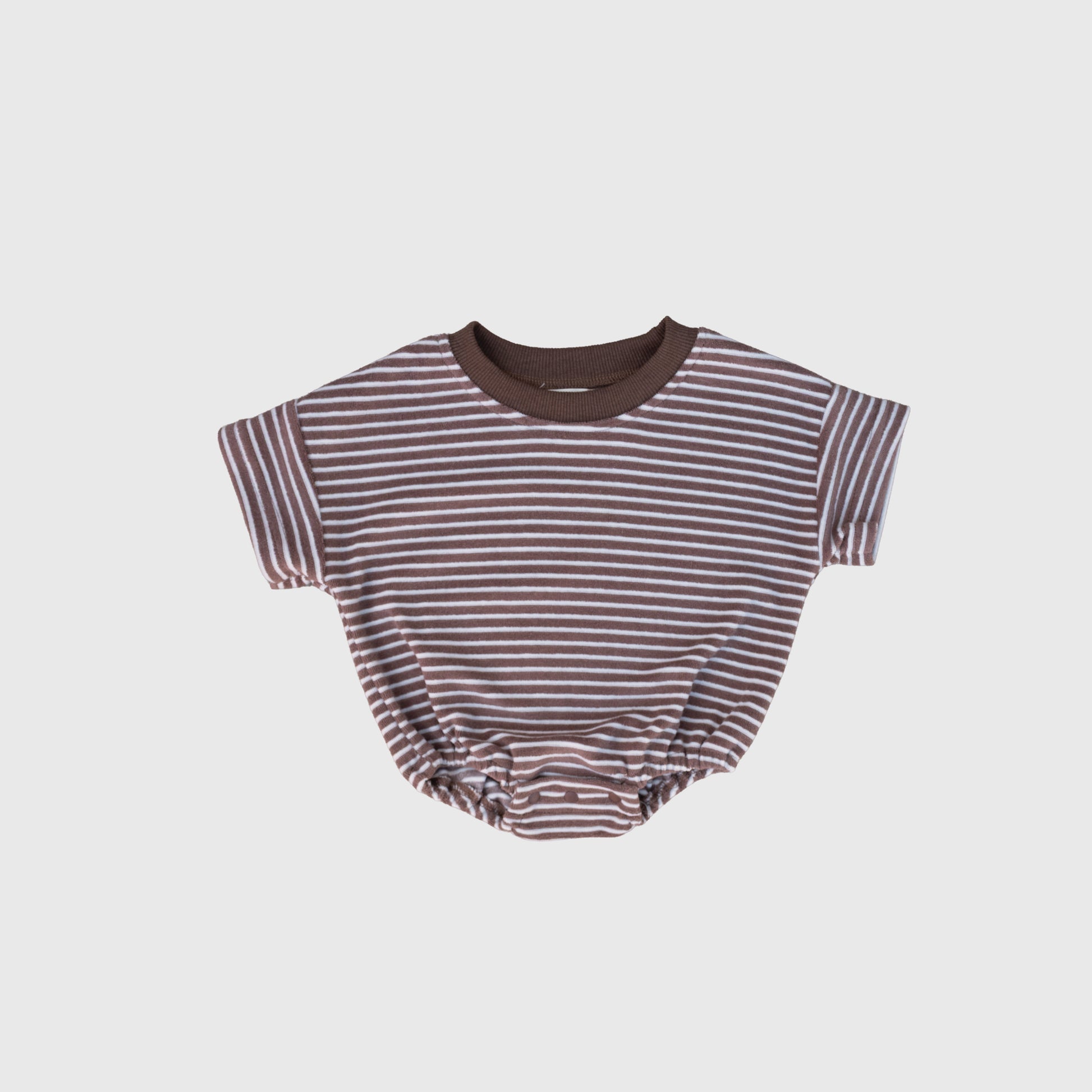 The forever french baby Terry T-Shirt Romper | Cola Stripe features brown and white stripes, a dark brown collar, and elastic leg openings—ideal for baby romper fans or coordinating matching family outfits.