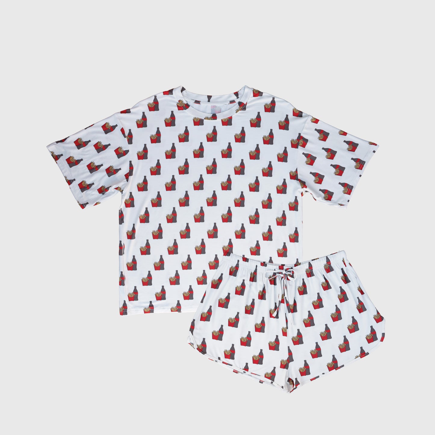 The Women's Bamboo Short Set | Fries & Cola by forever french baby features a white short-sleeve tee and matching shorts with red and black cat silhouettes, made from ultra-soft, breathable, hypoallergenic bamboo. Shown on a plain white background.