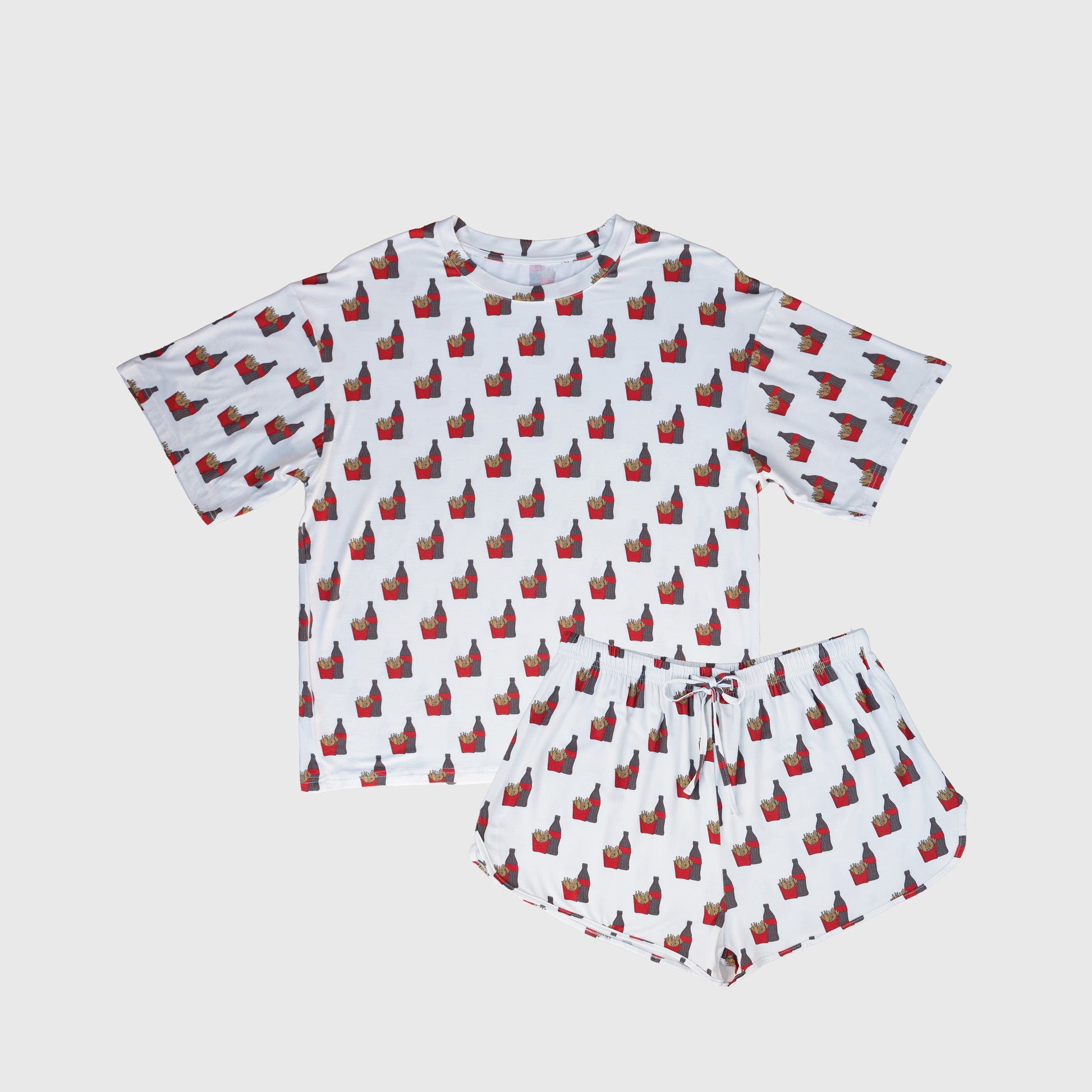 The Women's Bamboo Short Set | Fries & Cola by forever french baby features a white short-sleeve tee and matching shorts with red and black cat silhouettes, made from ultra-soft, breathable, hypoallergenic bamboo. Shown on a plain white background.