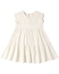 The Rylee + Cru Cecilia Dress in Ivory features short cap sleeves and a lacy, textured bodice. Its loose, flowing skirt lends a soft and delicate look, and the dress is displayed against a plain white background.