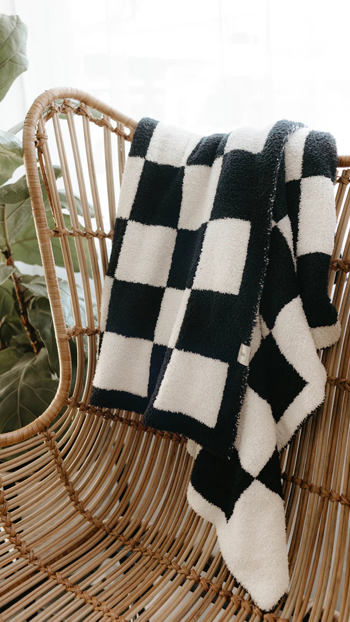 Black and 2024 white plaid throw