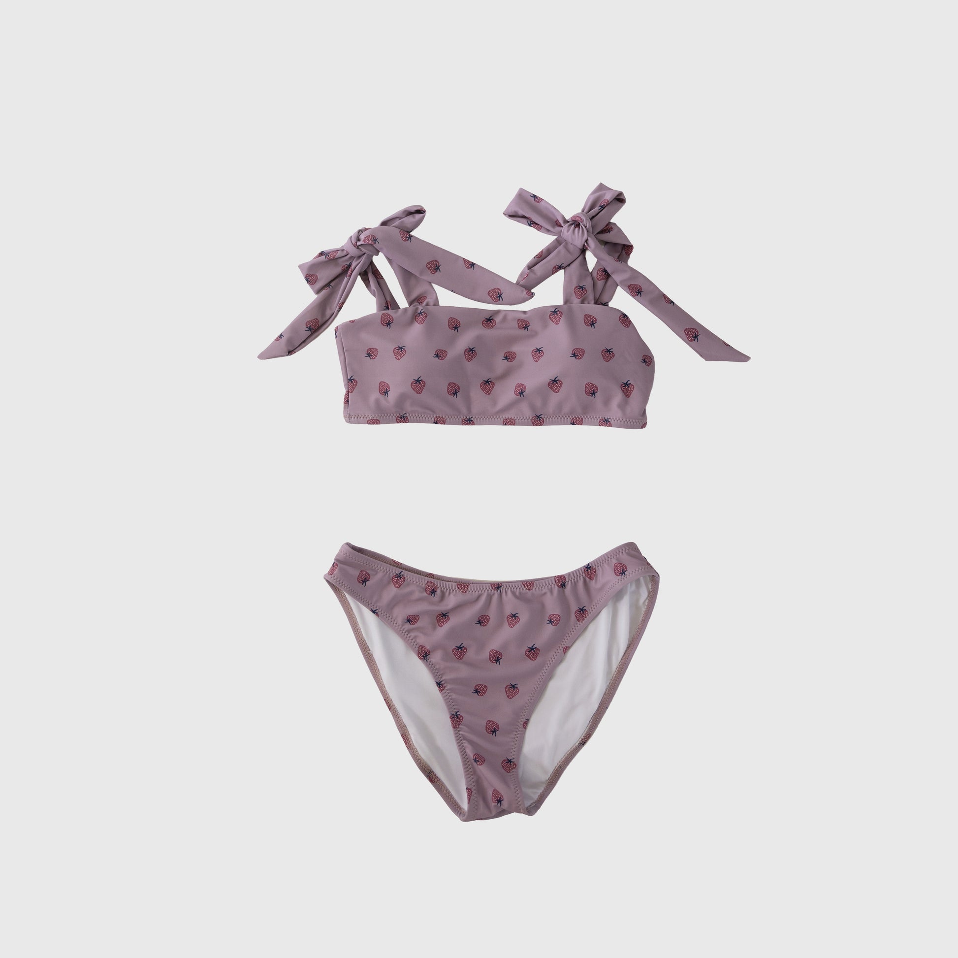 The forever french baby "Matilda" Women's Two Piece Swimsuit features a lavender base with small red hearts, a bandeau top with shoulder ties, and matching bottoms, shown on a white background.