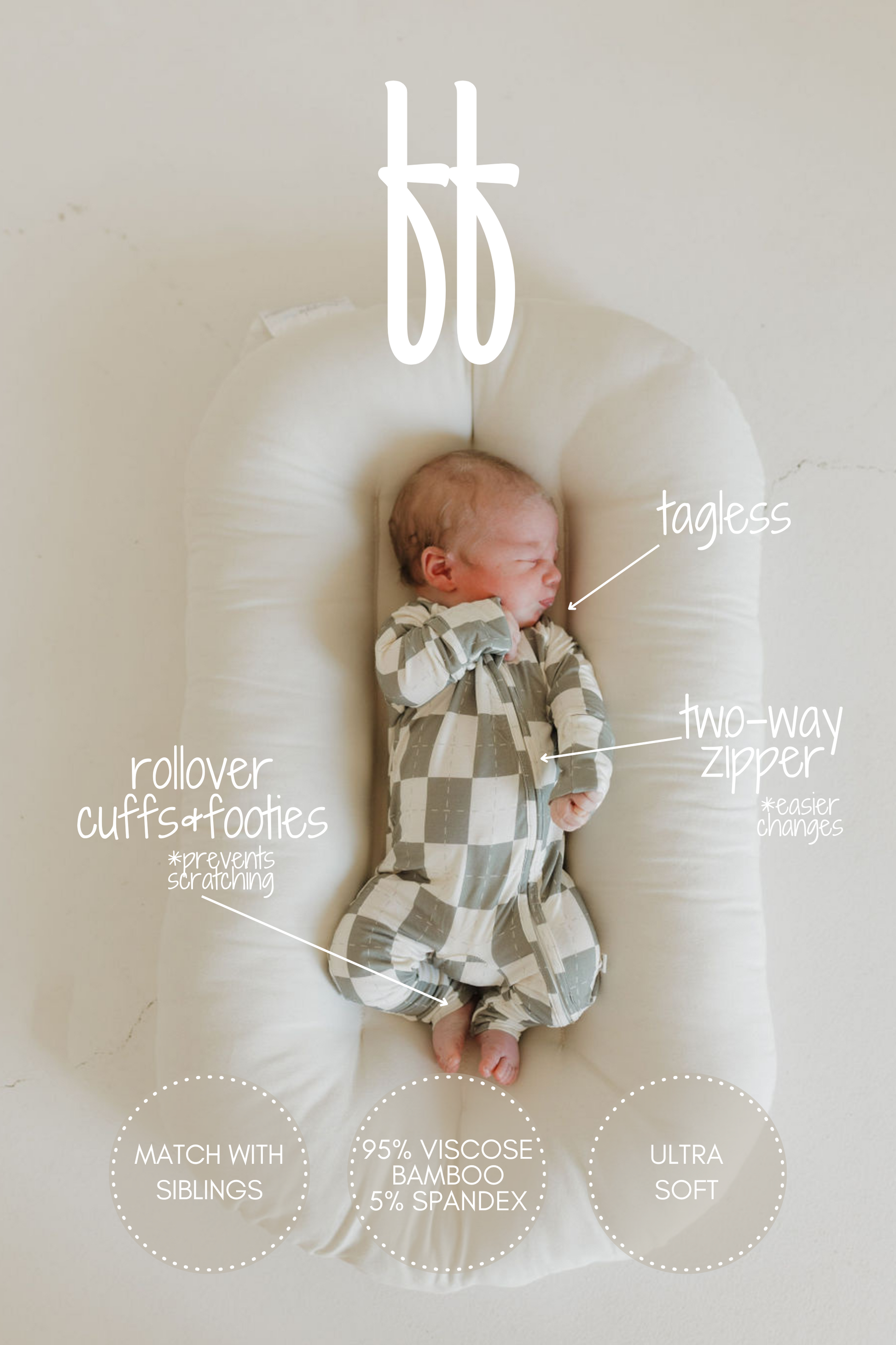 A baby sleeps in a cushioned bed wearing the forever french baby Bamboo Zip Pajamas in Oat & Sage, featuring a tagless design, two-way zipper, rollover cuffs, and footies made from 95% bamboo and 5% spandex.