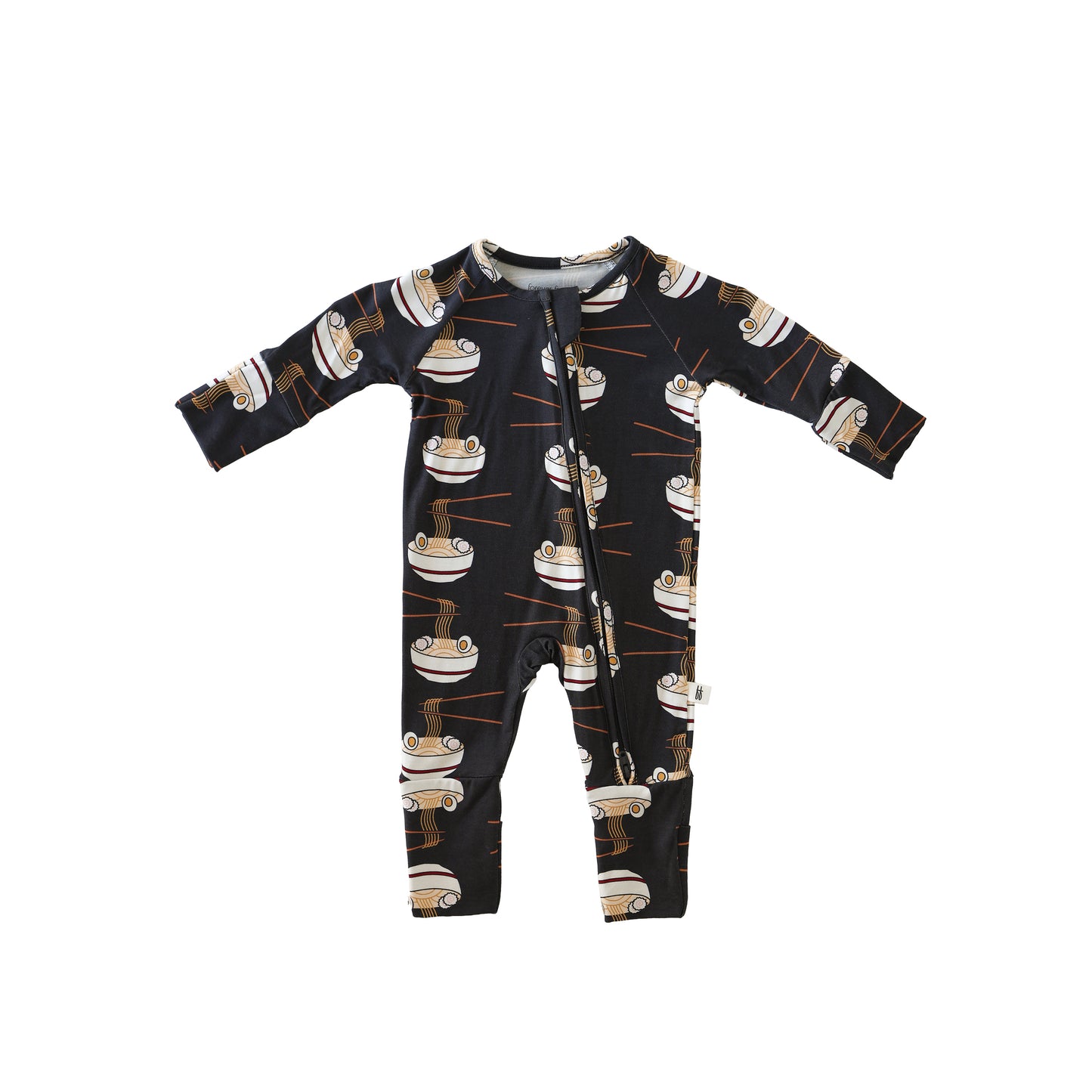 The Bamboo Zip Pajamas | Ramen by forever french baby is a long-sleeve romper made from breathable bamboo fabric, featuring a zipper and a playful ramen bowl, chopsticks, and eggs pattern in beige, brown, and white.
