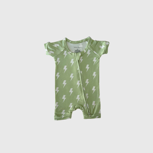 The forever french baby Shortie Bamboo Zip | Flash is a short-sleeved, light green hypo-allergenic bamboo romper for babies with a white lightning bolt pattern and diagonal neck-to-leg zipper, shown on a plain white background.