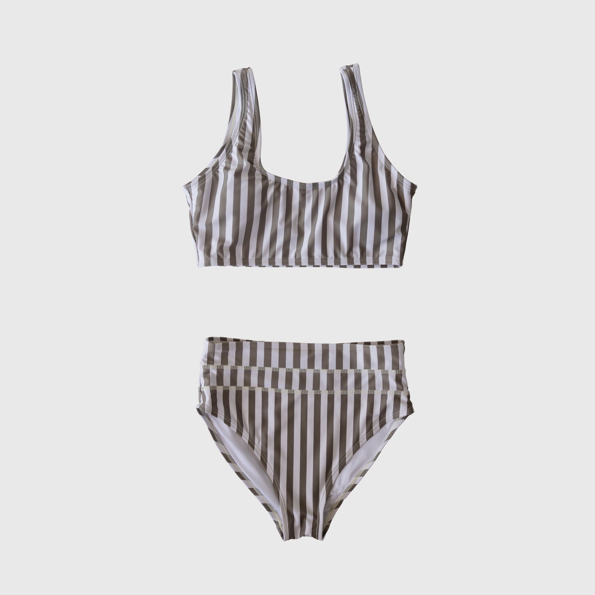 The forever french baby Women's Two Piece Swimsuit | Olive Stripe features vertical beige and white stripes, a scoop-neck top, and a high-waisted, high-leg bottom, shown on a plain white background.