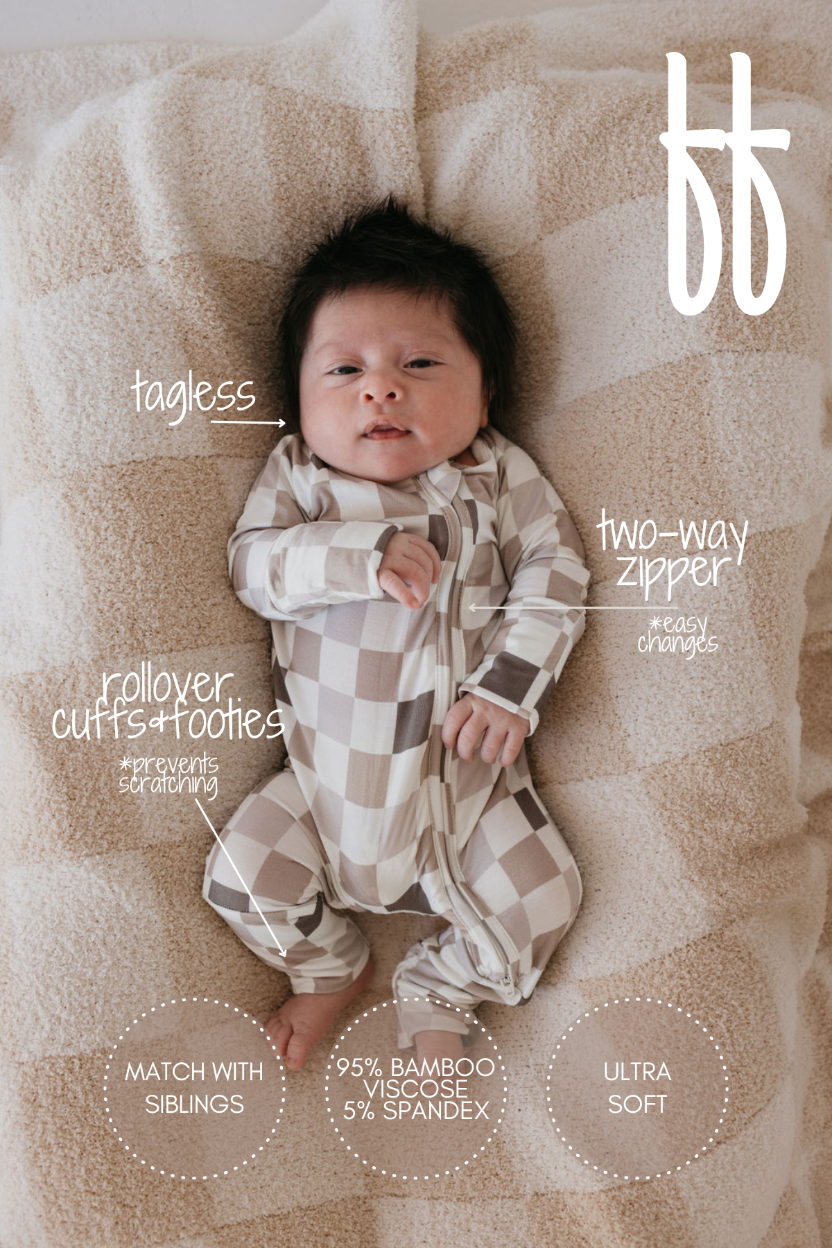 A baby is comfortably nestled on a soft, patterned blanket, wearing the "Bamboo Zip Pajamas | Into the Woods Checkerboard" by forever french baby. These pajamas boast features such as being tagless, having rollover cuffs and footies, a two-way zipper, and are crafted from 95% bamboo viscose. This hypo-allergenic fabric ensures breathable comfort. The text also highlights matching outfits for siblings and emphasizes the ultra-soft nature of the fabric.