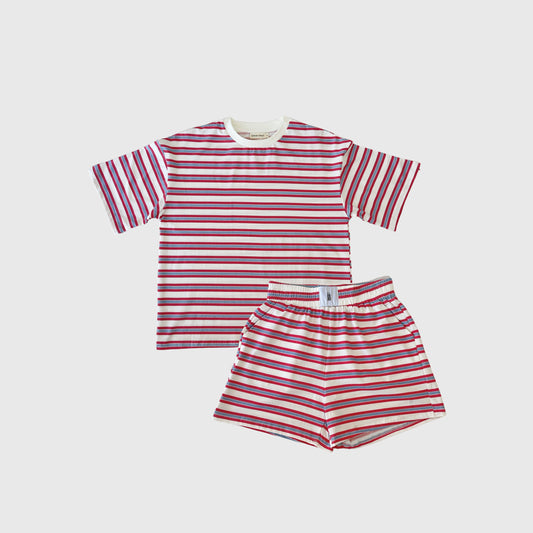 The forever french baby Women's Short Set | Heritage Stripe features a relaxed fit tee and shorts with red, white, and pink stripes. Displayed on a white background, it's perfect for matching family outfits.
